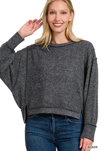 Exposed seam oversized sweater